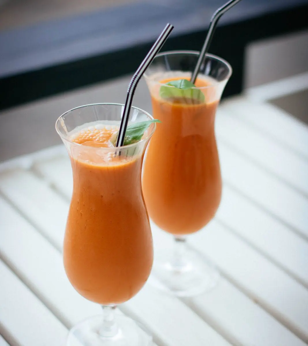 Two glasses of carrot juice