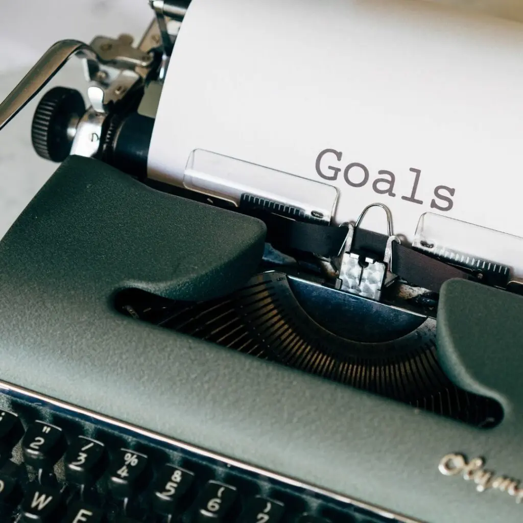 The word goal on a piece of paper in a typewriter