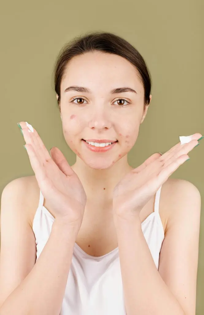 Woman framing her face with her hands