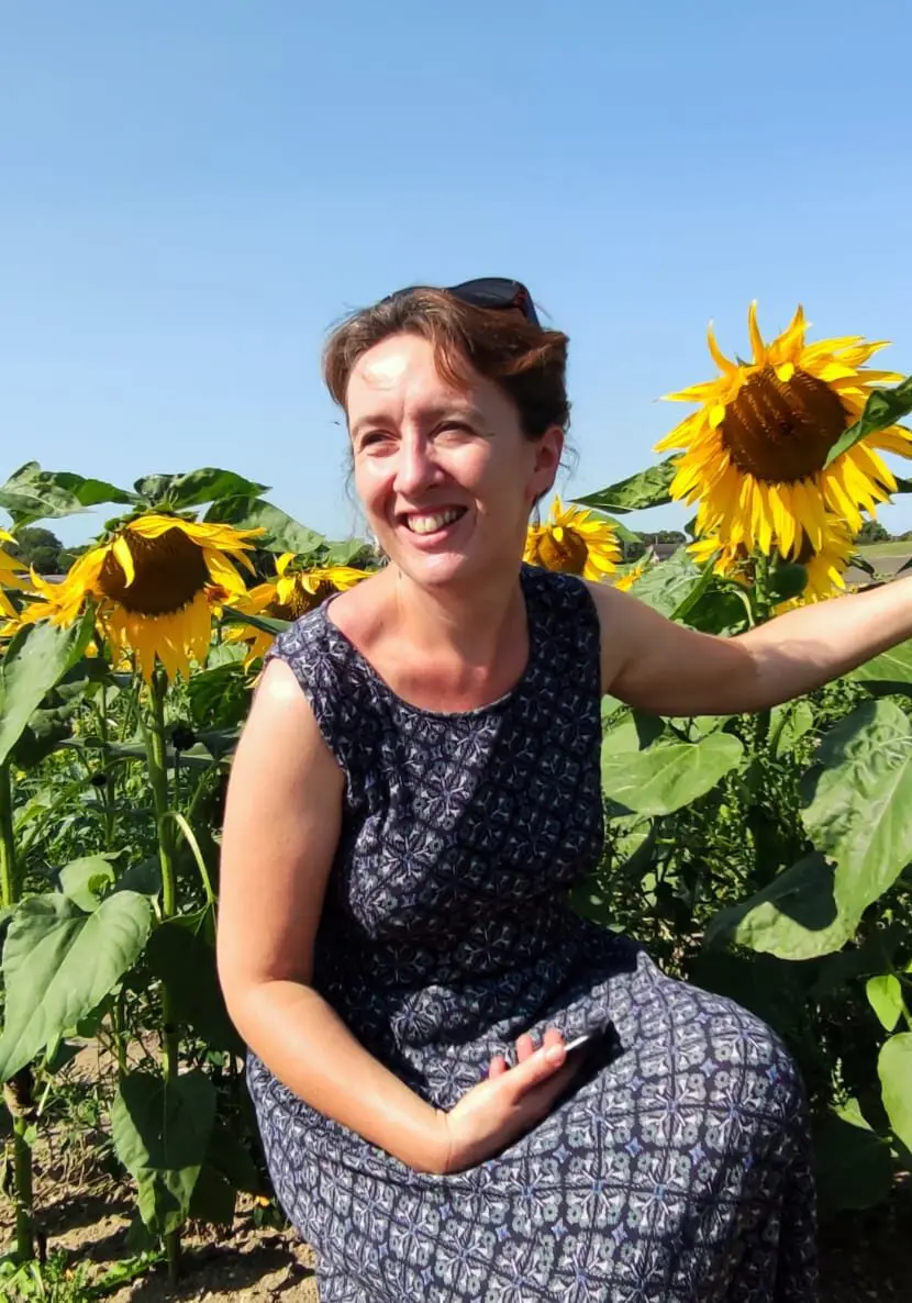 Emma in a sunflower field